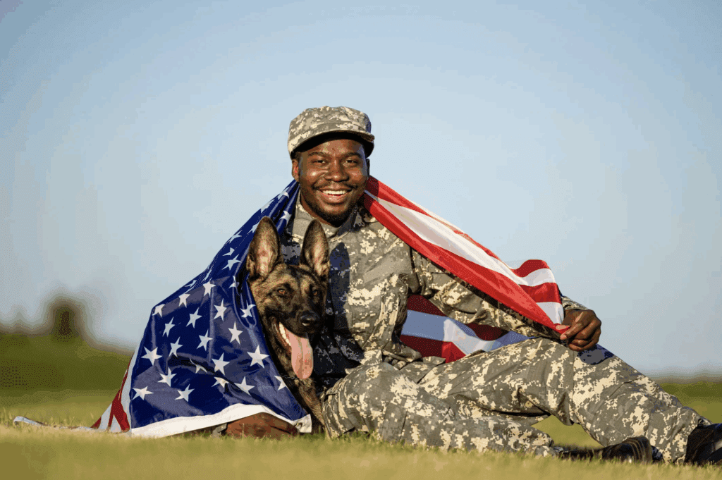 A military veteran sitting with his support dog